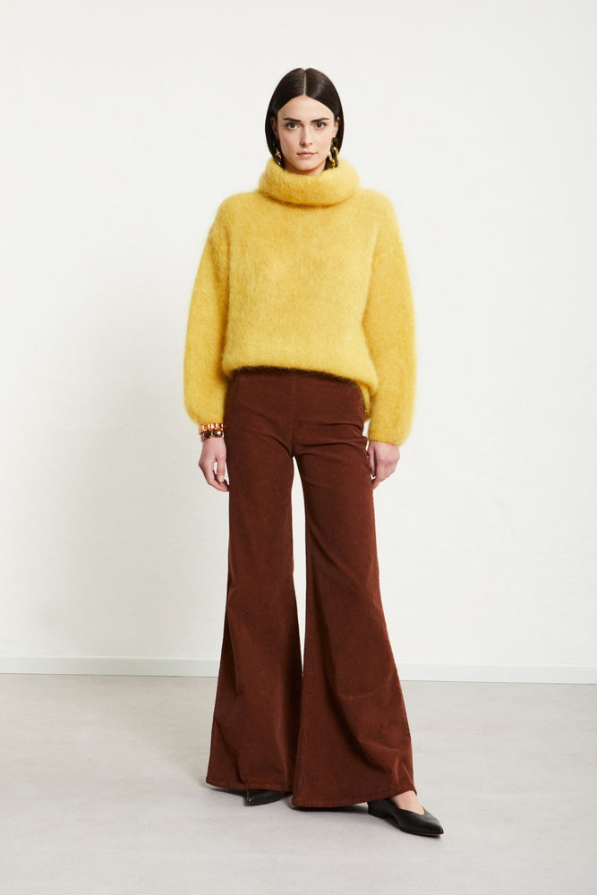 
                  
                    Mohair Roll Neck - Topazio
                  
                