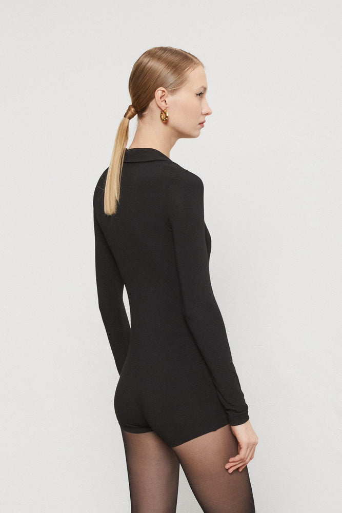 
                  
                    Knit Playsuit - Nero
                  
                